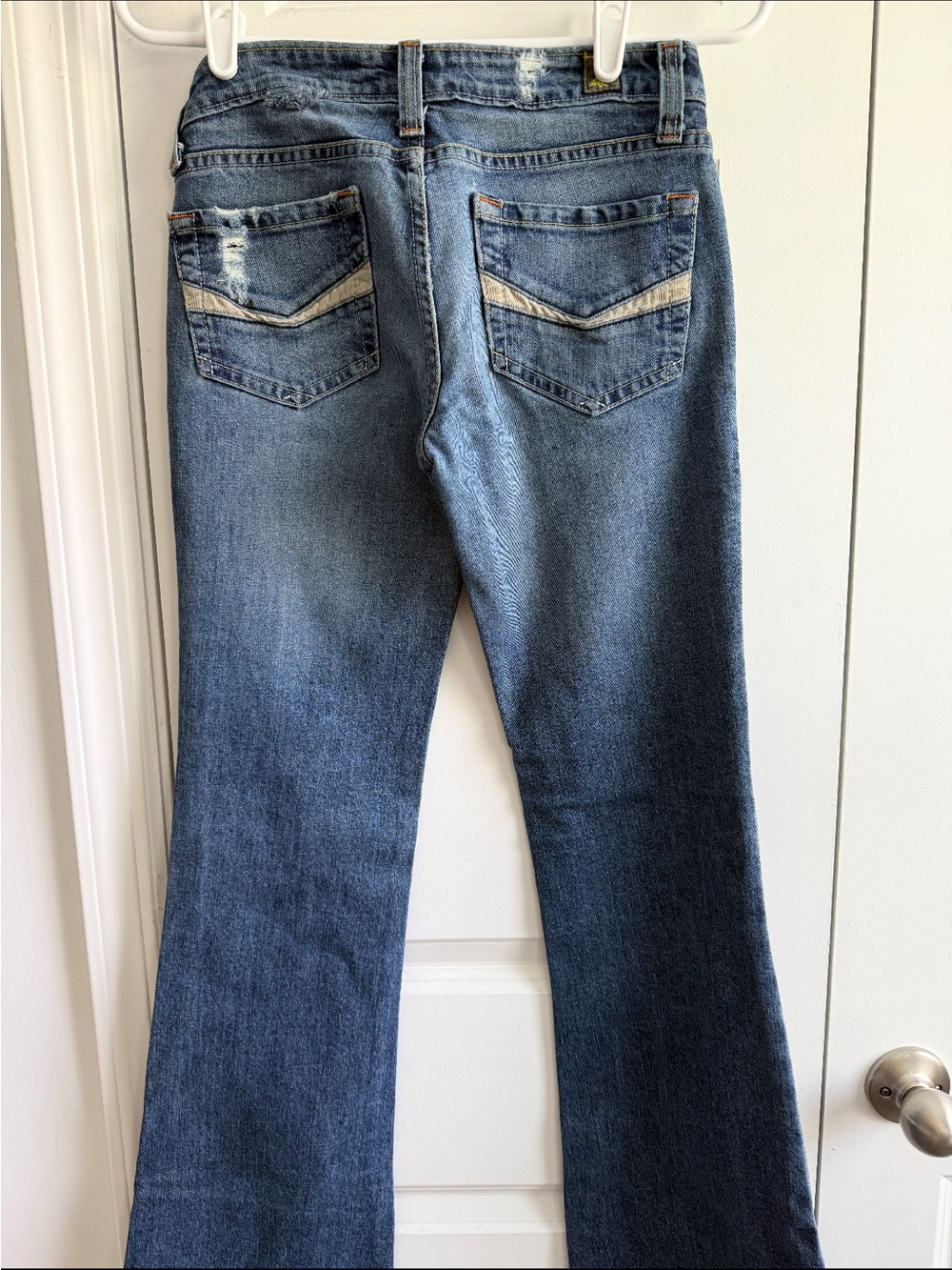 Women's Flared Jeans in Mid Blue with Back Pocket Detail